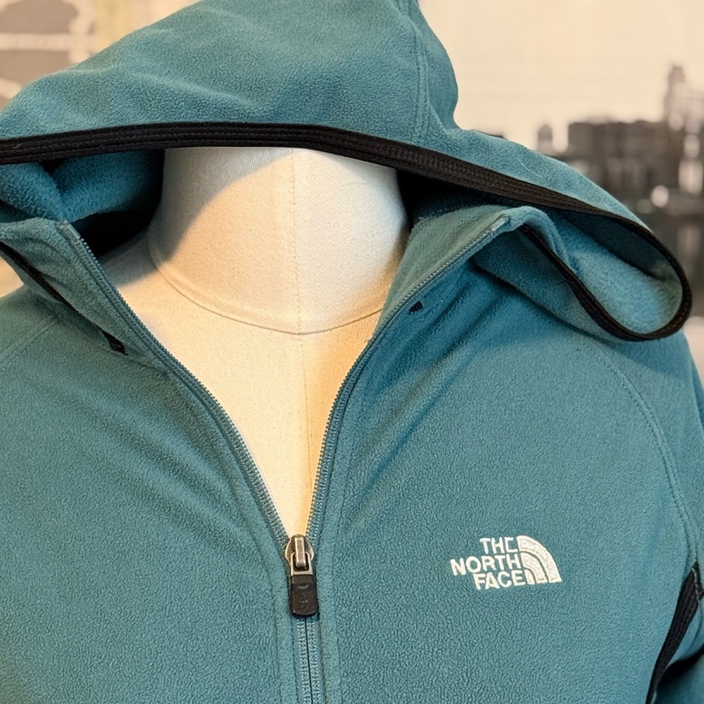 Teal North Face zip up jacket size XS
